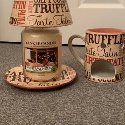 Yankee candle shade and plate with matching wax melt burner. Have been used but are still in very good condition. Candle not included