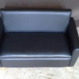 2 seat sofa with storage, in good condition. Dimensions are Height 21", Width 16.5", Length 31". Great for children's play room.