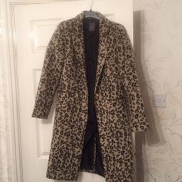 Leopard print coat,longline with button on front and two pockets, really smart looking label says 6 however fits me (size 8) sleeves are long for me as I’m petite.
