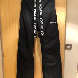 Men’s medium size black nevica ski pants.
They have a button fastening waistband with touch and close pad, touch and close adjustable waist straps, a zip fly, elasticated shoulder straps, ankle gaiters to keep powder and moisture at bay, two waterproofed zip fastening vents, plus two zip pockets.
Very good condition.