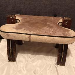 Sweet stall with cowhide seat
