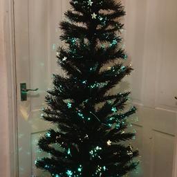 6ft black fibre optic star shimmer christmas tree.
in great condition. full working order. original box abit tatty but great for storing it in.