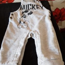 selling a good condition baby's Mickey mouse dungarees size 6 to 9 month old