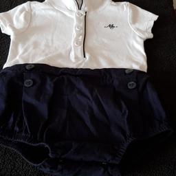 selling a baby's romber suit size i believe it is 3 to 6 month old