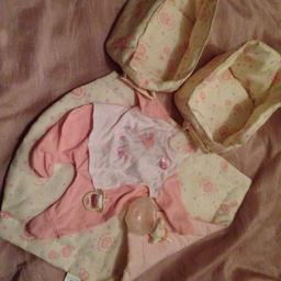Baby doll change mat, storage baskets, bottle, dummy and baby grow
