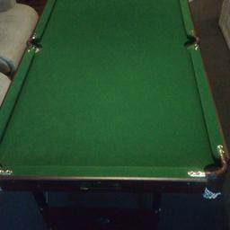 Pool table 4andhalf FT  by 2andhalf FT  good condition. Folding legs. Has no balls or cues unfortunately. Collection only