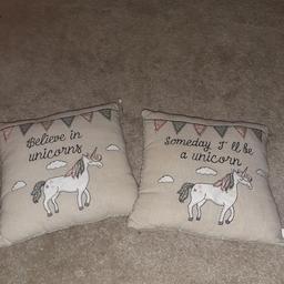 lovely unicorn cushions in good condition from non smoking home. £2 for both!!