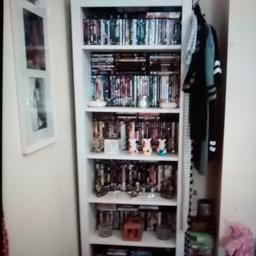 tall bookshelf white with grey speckles on it. excellent condition. collection tantobie