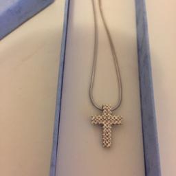 Lovely e sparkly half a carat diamond cross,worn about 3 times .All fully stamped .Collection only