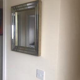 Wall mirror selling as moving house