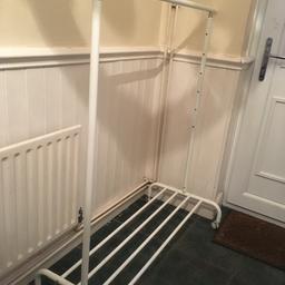 White clothes rail with storage space underneath, just over 1 metre width, small scuffs on top of rail where clothes hangers have been pulled along it nothing major.