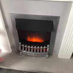 Electric fire suite, been painted in white gloss and grey wood paint. Few marks here and there, does need re-painting but all works perfect.
Only selling as changed living room around and no longer have space for it.