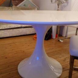 White high gloss table from dwell with 2 black and 2 white plastic chairs from dwell. Table has couple of slight marks unnoticable chairs excellent condition