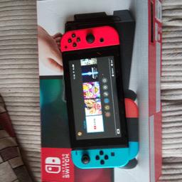 Nintendo switch 32gb comes with Dock charger boxed and Rayman legends collection only