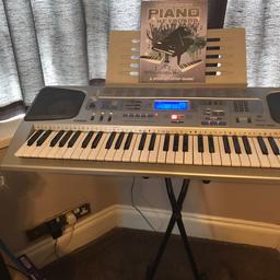In great used condition 
Great for its age 61 keys full size
Has 50 preloaded songs which you can learn to play as it shows you on the display
Includes Christmas songs too
Comes with adapter stand and 
Book how to play the piano and keyboard 
Collection only