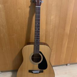 Excellent condition full size Yamaha F-310 Acoustic Guitar with Stagg Music padded bag with two pockets, Meridian LT-1000 Tuner, plectrum and two guitar books.

Any queries just message me :)