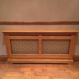 Solid Wood Radiator Cover Length 63 inches height 34 inches Hand Made.  Excellent Condition . Moving House reason for selling.