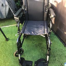 Wheel chair good condition seat belt and foot supports