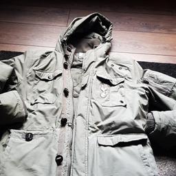 used...Tottenham hotspurs hooded coat...size L..in good condition..has several pockets..green..collection
