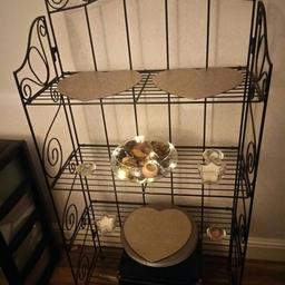 Black metal shelving unit. Excellent condition like new. Smoke free pet free home. Folds flat so easy transportation. First to see will buy.