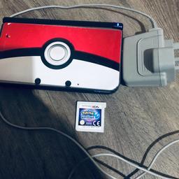 With charger and Pokemon moon game. Good condition
