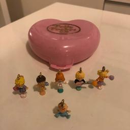 Promotional compact with figure charms