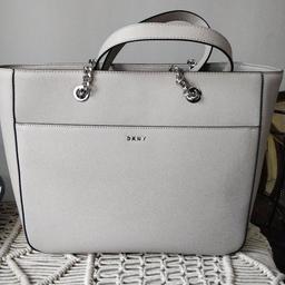 RRP £220
used only a few times, excellent condition. comes with DKNY black bag packaging bag.