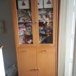 this is a very good quality solid display cabinet we didn't want it in our living room and more so I tried to use for baby clothes but it's just not what it's for so we decided to sell you can see from images is perfect condition feel free to come and view or just make a offer need it gone soon ish