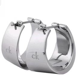 This is for a pair of polished stainless steel Calvin Klein optical Illusion elegant hoop earrings 20mm Brand new in box.
