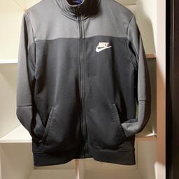 Original Nike Tracksuit Top
Size Medium 
Colour: Grey and Black 
Not brand New

Collection Only