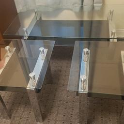 here are 3 glass and chrome tables.maybe bedside tables...2 small 21.5 ins long x 19.5 ins width x20 ins hight....and big one 47ins long x25.5 width x 20 ins hight all same hight..look like new..