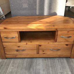 Next solid wood corner TV cabinet. Excellent condition, few minor marks. Dimensions 113cm (44.5 inches) width, 50cm (19.75 inches) depth and 51cm (20 inches) height. Collection only