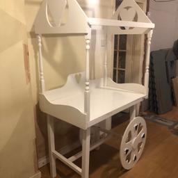 Originally used as a candy cart- can be used to sell items or for cake displays etc
TAKING OFFERS
Has a bit of damage seen by the pictures
Will look really great with some material put into it, some flowers and a fresh layer of paint
Comes in two pieces
Collection only
