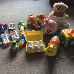 14 toys -excellent condition and full working order £15 for whole bundle or prices below:
Chad Valley- Pull along Caterpillar- £2.
Tomy- Hide and Seek eggs- £2.50
Vtech - Crawl and Learn-£3
Tiny Love- Follow me dog-  £4
Fisher Price - Caterpillar-£2
Gund - Peek a Boo teddy-£2.50
Little Tikes - Teething Car Keys-£1.50
Little Tikes- Mobile Phone-£1
Little Tikes- hammer-£1
Little Tikes - Push along car-£1
Fisher Price - Mobile Phone-£2
B&M - Remote Control-£1.50
Vtech- Bulldozer-£1
Activity box-£1