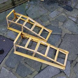 a pair of portable car ramps