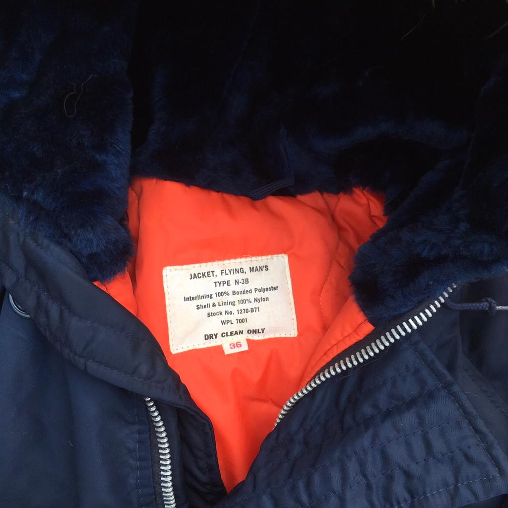 Snorkel parka hot sale orange lining
