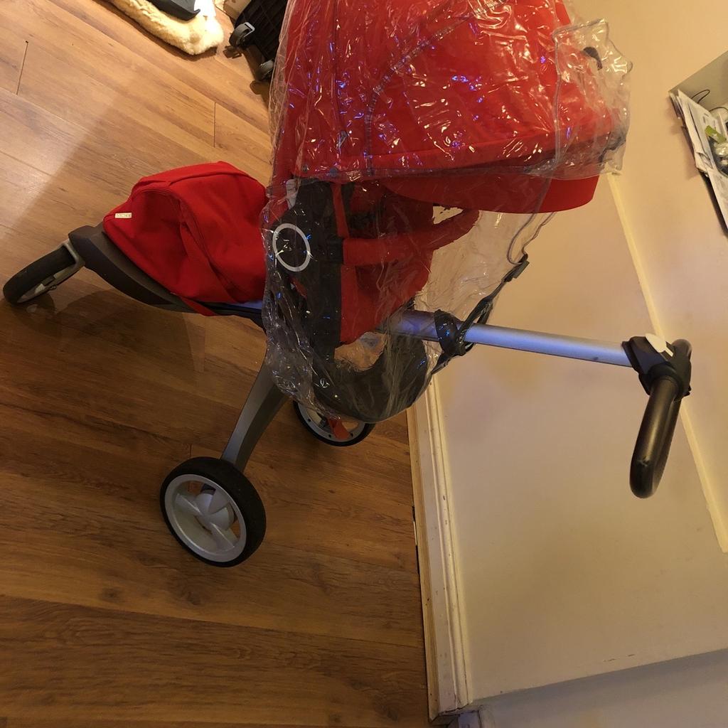 Red stokke pushchair as good as new there are few scratches but not visible.
Barely used