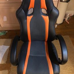 Black/Orange 
Computer/Gaming chair
No longer used

A couple of tears on the back and left arm as shown, other than that it’s in great condition.