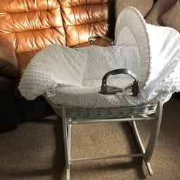 Clair de Lune Moses basket in excellent condition. All are washed. 
Included basket with grey rocking stand, mattress, 2 fitted cotton sheets, 3 blankets.