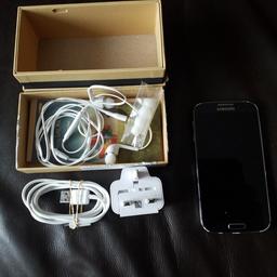 Samsung Galaxy S4 mobile phone. Black Mist coloured. Unlocked to any network. In good condition with the usual signs of wear around the edges, (see on photos). Comes with all the original extras and packaging/ instructions.