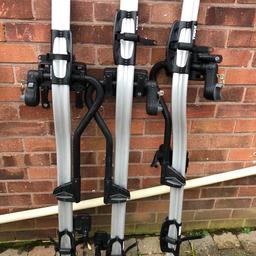 X3 The Thule 591 Bike carriers. Excellent condition. Pick up only. 
The best selling bike/cycle carrier/rack. It is a roof mounted bicycle/bike carrier and holds one bike though it is possible to fit up to four Thule 591 ProRide's to a vehicles roof bars. Lightweight and easy to fit to almost any type of roof bar (up to 60mm wide). The fitting process takes approximately 5 minutes with the option of either clamping it directly onto the roof bars or using T track adapters.
