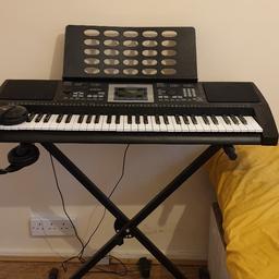 Keyboard with stand, music sheet stand and headphones

Barely used perfect conditions