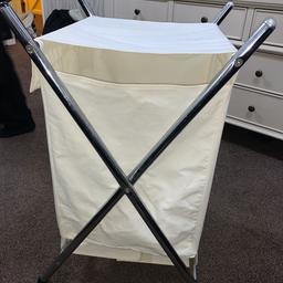 White laundry basket with silver stand 
Opens and comes off the stand
