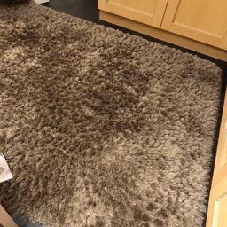 Large Rug, we paid over £300 less than 12 months ago from Dunelm.

Selling because we are getting carpet fitted instead.

I would describe the colour as mink / medium brown.

240cm by 170cm
