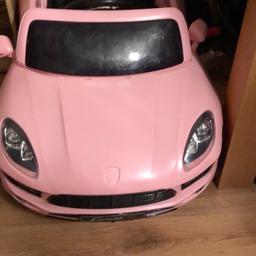 Pink Porsche used but good condition everything works as it should doors open leather cushioned seat aux lights