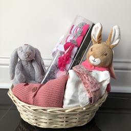 Next clothes (1 outfit and cardigan) 0-3 months £34.99 
Laura Ashley baby socks £9.99
M&S Rabbits £25