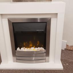 Electric fireplace and surround.

75cm width 78cm tall 18 depth fire place