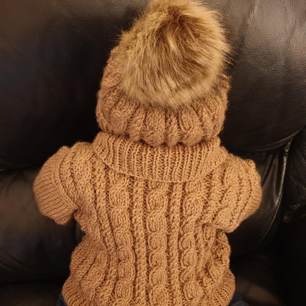 Ist photo shows more true colour
Deposit £5 time of Order non Refundable
Knitted Ridge Cable Cardigan with Fur Pom Pom Hat
Mocha
Chest 22"
Length 13"
Sleeve 8"
postage extra cost