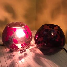 Purple flower patterned bedside table lamps. No longer need as changed colour scheme. Two lamps available. Collection only. Many thanks for looking.