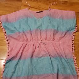 says medium but was my daughters age 10-11 used as swimming costume cover up
Worn but plenty of wear left just too small for my Daughter now.
Thanks for looking plenty of items to add so please check other items :)